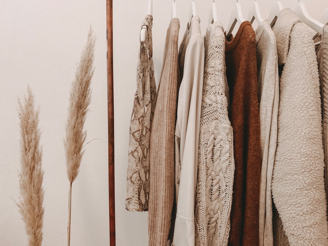 hanged-top-on-brown-and-white-clothes-horse-ts-unw-jqe